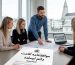 متخصص ایرانی در حال کار در رِیکیاویک ایسلند با موافقت‌نامه اقامت دائم نمادین روی میز